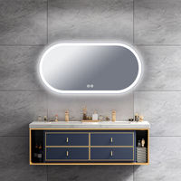 Miroir de courtoisie LED ovale de style moderne Appliques murales décoratives en gros Miroir LED encadré illuminé par écran tactile