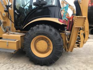 รถตักล้อยางมือสองคุณภาพสูง Caterpillar CAT 428F จากเซี่ยงไฮ้ ประเทศจีน - เกียร์ ลูกปืน เครื่องยนต์ มอเตอร์ ปั๊ม กล่องเกียร์ สภาพดี - Product Image 5