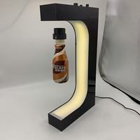 Nouveau présentoir de canette de vin de bouteille de lévitation magnétique ajusté avec 1kgs lourd