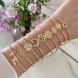 Gelang Tenis CZ Sederhana TK-B425 Berlapis Emas 18k dengan Liontin Cakar Hewan, Matahari, Bulan, Bunga Daisy, dan Bintang untuk Anak Perempuan, Hadiah untuk Anak-anak - Product Image 1