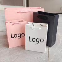 Sacs à provisions pour vêtements en papier blanc de marque privée avec poignée vendeur de sacs d'emballage de bijoux durables en gros