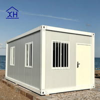Maisons conteneurs modulaires détachables avec fenêtres en verre et design respirant pour bureau, salon et chambre à coucher