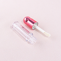 Tube de brillant à lèvres en forme de boule de 4.5ml Récipient d'huile pour les lèvres de maquillage Tube de blâme pour lèvres transparent personnalisé pour emballage cosmétique