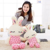 Vente en gros de lapin à longues pattes lumineux de dessin animé LOVE peluche douce animal lapin à DEL