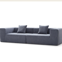 Canapé sectionnel moderne en tissu, trois places, design modulaire, dossier lâche, accoudoirs droits, mobilier de salon, couleur grise