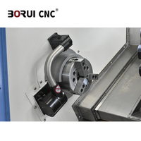 Centre d'usinage à double broche haute précision MJS1000 avec tourelle motorisée, une machine pour le perçage hors centre des raccords hydrauliques