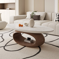 Table basse ovale moderne de luxe léger avec plateau en roche et base en bois massif noir, facile à nettoyer pour le salon.