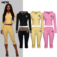 Ensemble de loungewear décontracté pour femme automne, couleur unie, haut à manches longues zippé, pantalon court à taille repliée, tenue de sport
