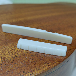 Juego de puente de hueso de vaca puro <span class=keywords><strong>para</strong></span> <span class=keywords><strong>guitarra</strong></span> folk YMH con embalaje en bolsa - Product Image 6