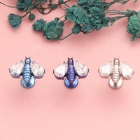 ASTM F136 G23 titane CZ ailes pavées à filetage interne Push In Top Labret goujons boucles d'oreilles abeille