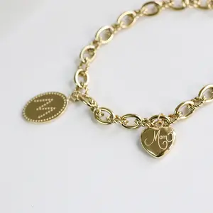 Bracelet de marque M ovale en acier inoxydable plaqué or 14K à breloques cœur Bracelet de maman
