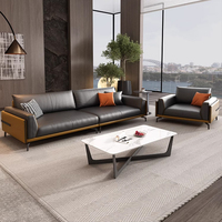 Canapé de bureau modulable trois places en cuir véritable moderne, combinaison table basse pour appartement commercial