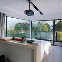 Structure en acier économique pour l'ajout d'hébergements, retour sur investissement élevé, design moderne. Prix direct usine pour l'entrée du parc Villa