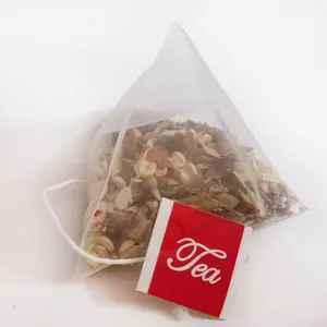 Bolsa triangular de nailon/fibra de maíz/tela no tejida, rollo de material desechable, bolsa de té con filtro de flores
