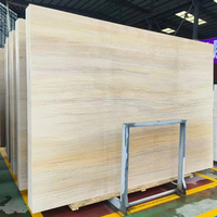Carreaux de marbre beige clair en bois de Ginkgo, découpés sur mesure pour les atriums de centres commerciaux haut de gamme et les espaces de vente au détail design