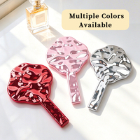 Miroir de maquillage portable Lucky Clover rose, finition argentée ondulée en métal liquide à quatre feuilles pour femmes, logo personnalisé ODM OEM