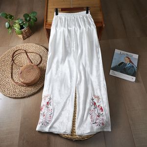 Traditional Chinese Embroidered Wide Leg Pants Black And White Loose Fit Casual Pants For Women With Floral Design - Product Image 3