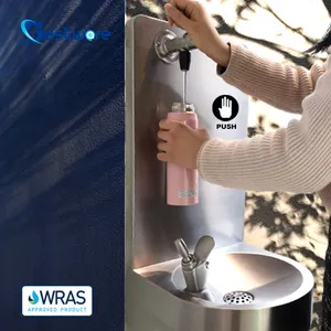 Rubinetto del lavandino del rubinetto fissato al muro del riempitore della bottiglia della stazione bevente dell'acqua pubblica di chiusura automatica per il parco