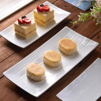 Assiette à sushi en céramique blanche moderne, créative, japonaise, occidentale, pour desserts, en-cas, longue assiette, jetable, vaisselle de table