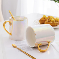 Fourniture directe par le fabricant de tasses en céramique plaquée or en porcelaine blanche glaçure de perles tasses créatives à lait frais et à café pour les fêtes