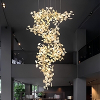 Lustre suspendu personnalisé en forme de fleur pour hôtel, villa, hall d'entrée, escalier, lampe suspendue LED, décoration moderne, long lustre en céramique en forme de feuille de Ginkgo