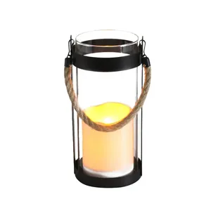 مصابيح ديكور من المصنع مباشرة للمهرجانات LED مصباح شمع مضيء أصفر مضيء شمع معدني شمع زجاجي فانوس شمعي شمسي