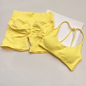 Yimo 9 colori moda donna tinta unita Cross Back reggiseno Yoga Set da donna scricchiolante <span class=keywords><strong>pantaloncini</strong></span> da ginnastica tuta da donna ad asciugatura rapida Set sportivo - Product Image 1