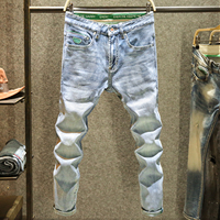 Nouveau pantalon décontracté en jean pour homme 2024, coupe droite, imprimé graffiti artistique, style streetwear, effet usé urbain, collection automne