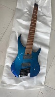 Guitare électrique bleue à 7 cordes avec manche en érable carbone, design sans tête, dos/côtés en acajou, matériau latéral en acajou