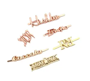 Factory wholesale Pure Digital pure letter zinc alloy metal pin sign electroplating die casting knitted hat metal nameplate