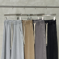 Pantalon de survêtement large en coton pur 380 GSM, teint à la cire, effet vieilli, bords effilochés, patchwork, drapé, avec logo personnalisé