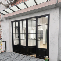 Porte d'entrée double arquée en fer de style européen, en alliage d'aluminium antique, avec verre trempé, moderne, sécurisée et coupe-vent pour l'extérieur