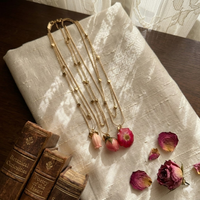 Collier romantique en acier inoxydable avec pendentif cœur et fleurs de lys de la vallée, cadeau d'amour pour la Saint-Valentin