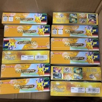 En stock : Packs de boosters Pokémon M6a 30e anniversaire chinois avec boîte originale en cuir véritable et cartes de Charizard