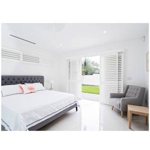 Volets de plantation blancs comme neige persiennes en pvc volets de fenêtre électriques intérieurs de Chine - Product Image 5