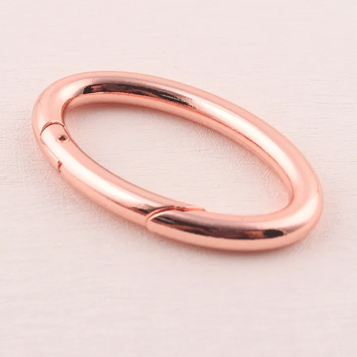 Forma ovale borsetta in metallo porta o anello moschettone per portachiavi cordino