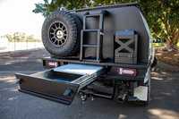Ecocampor 4x4, plateau de camionnette, auvent de camping-car, plateau en aluminium et topper, remorque avec boîte à outils, cuisine et lit disponibles à la vente