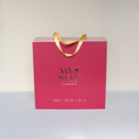 Boîte à poignée en carton de luxe personnalisée pour l'emballage de vêtements Boîte d'expédition magnétique pour vêtements Grande boîte d'emballage cadeau en papier