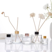 Vente en gros de flacons diffuseurs à roseaux ronds vides de luxe contenants diffuseurs à roseaux décoratifs 100ml 200ml flacons diffuseurs noirs avec roseaux