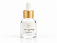 Flacon compte-gouttes cylindrique en verre 20ml 30ml transparent dépoli orange rechargeable pour huiles essentielles et sérums, avec bouchon en bois doré ou argenté, cosmétique