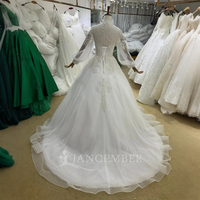 Gaun Pengantin Model Ball Gown BH30 Warna Ivory dengan Kerah Tinggi, Aplikasi Kristal, Renda Floral, Lengan Panjang, dan Tali di Bagian Belakang