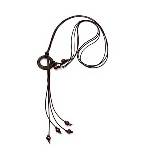 Bohemian Lariat Necklace with Antique Bronze Plated Ring and Hemp Rope Tassel Design Unisex Jewelry - Product Image 1