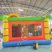 Structure gonflable combinée avec toboggan et mur d'escalade pour enfants