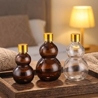 Vente en gros de flacons en verre pour huiles essentielles et cosmétiques, vides, fantaisie, en forme de courge, ambrés et transparents, anti-fuite, avec boîte, 10ml, 20ml, 30ml, 50ml, 100ml