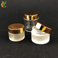 Pot en verre de crème plate de 20ml 50ml 100ml avec couvercle en or et argent et couvercle hermétique pour crème de soin de la peau contenant une bouteille cosmétique blanche transparente