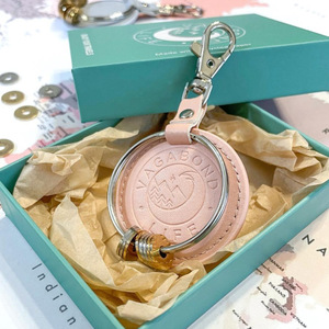 Cross-border best-selling traveler PU <b>leather</b> <b>keychain</b>, simple and portable, can be used as a bag key pendant, creative travel - Product Image 1