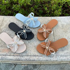 Summer Women Outdoor Slippers Handicraft Flat Slide Sandals <b>With</b> Contrast Edge <b>Bow</b> And Pearl Decor Daily Casual Footwear - Product Image 1