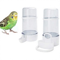 Distributeur automatique d'aliments pour oiseaux portable et étanche, en forme de bouteille, en acrylique solide, accessoires de cage suspendus pour ara et perroquets