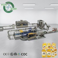 Ligne de remplissage d'huile linéaire industrielle 400-2000 BPH avec bouchage par soufflage et étiquetage pour bouteilles PET carrées de 3 à 10 L