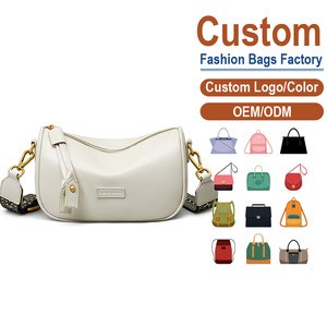 Bolso bandolera de cuero auténtico de grano completo – Silueta de media luna en color marfil con correa tejida | Tacto suave y flexible - Una mezcla de encanto vintage - Product Image 1